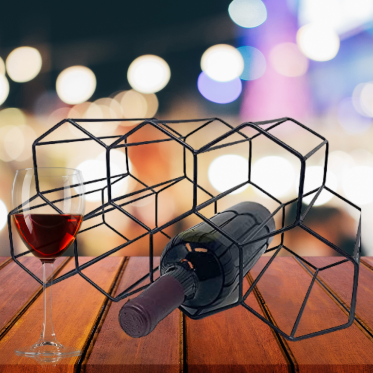 Wine rack on a wooden table at night time